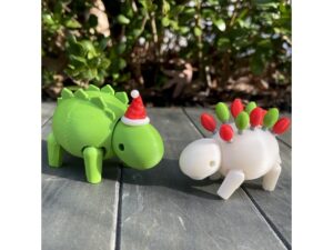 Holiday Articulating Stegosauruses: Stego-Claus & Holiday Lights Stego by JPRoseBoutique
