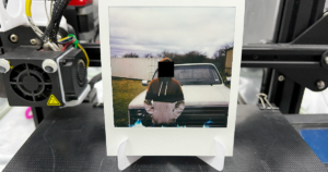polaroid film stand