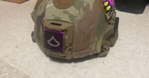 Helmet earpro holder