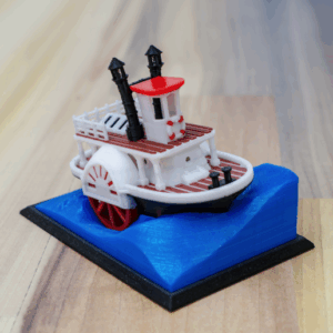 Old paddle-wheel steam boat with display stand (visual benchy)
