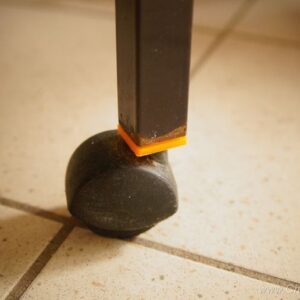Roll foot cradle / holder for a bird cage or other rectangular tubes