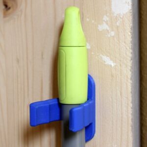 Universal hook for brooms and vacuum cleaners