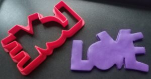 Valentine's Day cookie cutter love and kiss